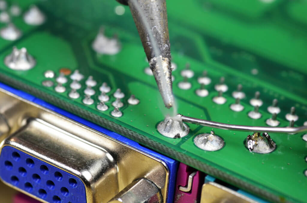 Circuit Board Repair & Rework | Canada's Leader in PCB Repair. Installation and soldering of electronic components using a soldering iron.